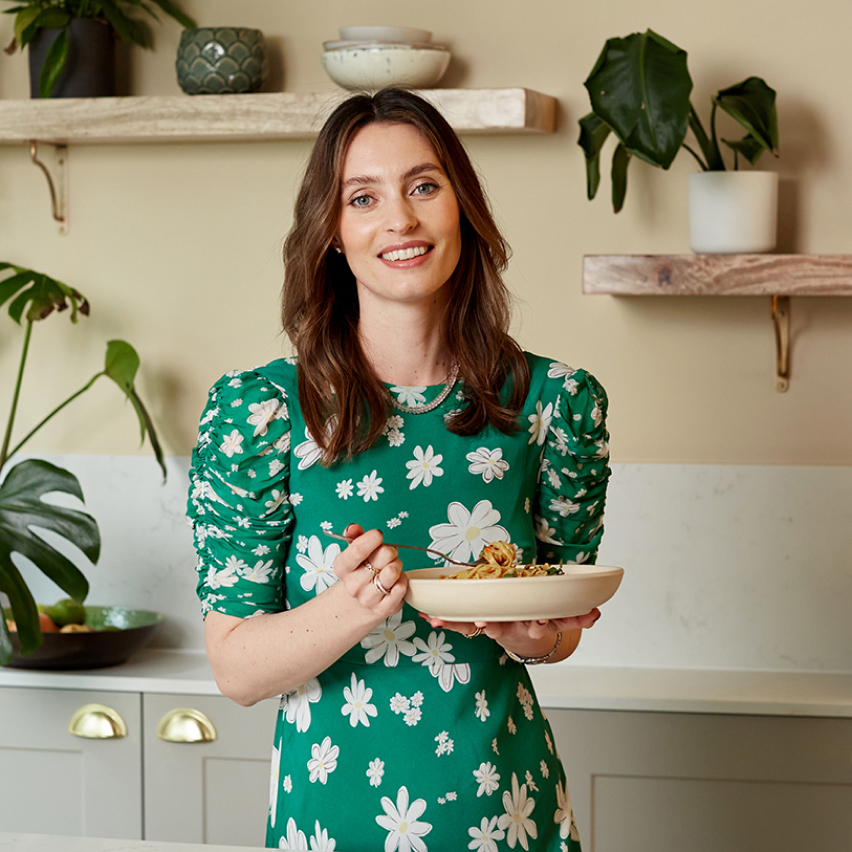 Ella Woodward, founder of Deliciously Ella, holding her cereal
